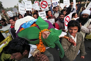Students hold a mock funeral procession against Bt (Bacillus thuringenesis) brinjal