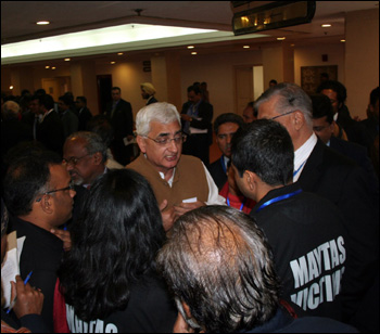 Angry NRIs gheraoing Minister for Corporate and Minority Affairs Salman Khursheed.