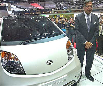 Ratan Tata along with the small wonder, Tata Nano.