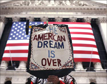 A sign at the NYSE depicting the immigrants' plight.