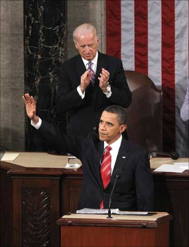 US President Barack Obama speaks during his first State of the Union address on Capitol Hill in Washington.