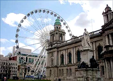 A 60-metre high Ferris stands close to Belfast's City Hall in Northern Ireland.