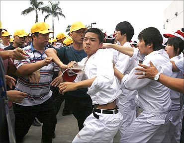 Workers clash at a Honda plant in Foshan.