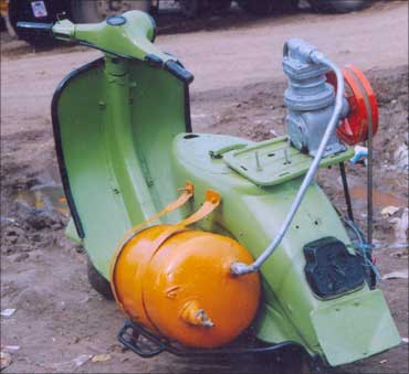 The scooter-powered spray painting device.