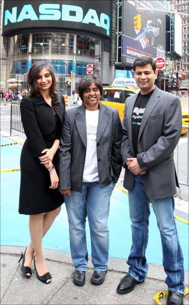 The trio in front of the Nasdaq building in New York.