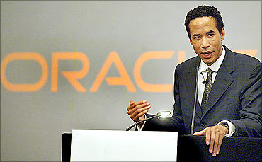 Charles E Phillips, Jr., president of Oracle Corporation, speaks at a press conference.