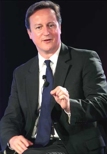 Britain's Prime Minister David Cameron speaks during a business meeting in New Delhi.