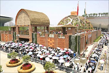 Visitors queue to enter the India Pavilion at the Shanghai World Expo site.