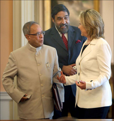 Finance Minister Pranab Mukherjee, Commerce Minister Anand Sharma with Hillary Clinton.