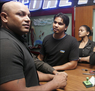 No holds barred: Wrestlers get corporate identity