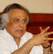 Environment Minister Jairam Ramesh speaks with members of the Chinese delegation.