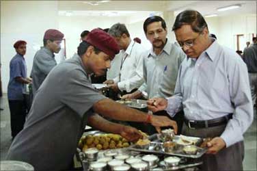 A file photo of Narayana Murthy in his office cafeteria during lunch time.