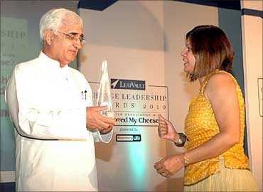 Rajkumar Hirani's wife receives the award.