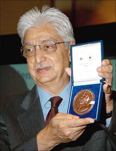 Wipro chairman Azim Premji poses with the Faraday Medal.