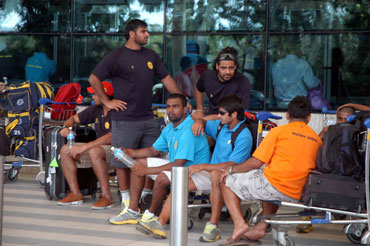 The stranded members of India's rugby team at the Mumbai airport.