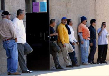 People queueing up at an employment agency.