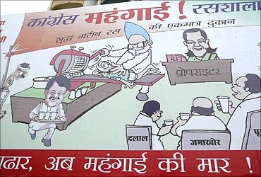A billboard installed by India's main opposition Bharatiya Janata Party (BJP) against inflation during the rule of UPA.