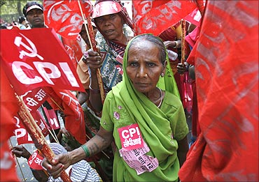 Women attend a rally organised by the Communist Party of India.