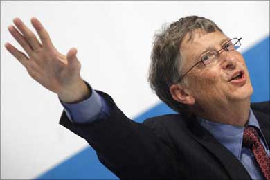 Bill Gates gestures during a news conference in Vienna.