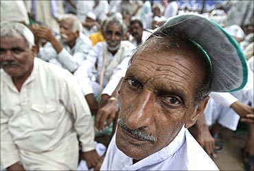 Farmers attend a protest in New Delhi.