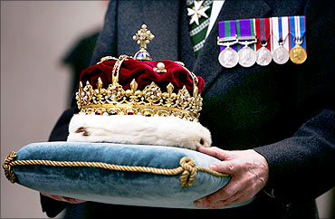 The Scottish Crown Jewels are carried by the Duke of Hamilton.