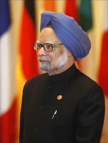 Prime Minister Manmohan Singh arrives for the opening plenary session of the G20 Summit in Seoul on November 12, 2010.