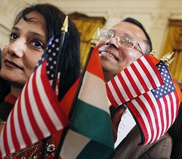 People hold American flags.