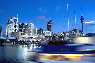 Viaduct Harbour is seen in the foreground, the Sky Tower at right.