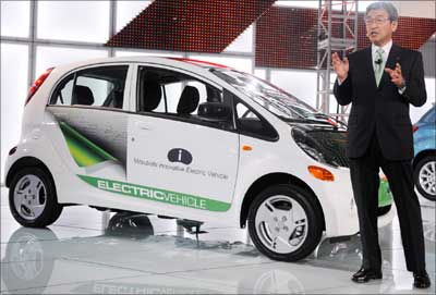 Shinichi Kurihara, President and CEO of Mitsubishi Motors North America, introduces the Mitsubishi i electric vehicle.