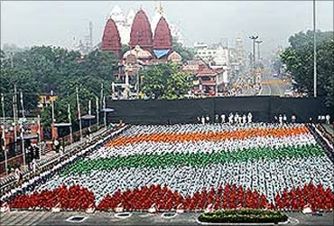 School children participate in a full-dress rehearsal during Independence Day celebrations at Red Fort.