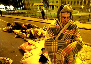 Unemployed workers spend the night in front of the Macedonian Parliament during a protest.