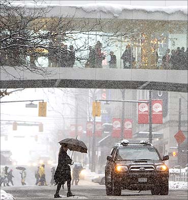 Shoppers out in snowy Vancouver.