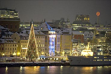 A traditional Christmas tree is seen on the Skeppsbro quay, Stockholm.