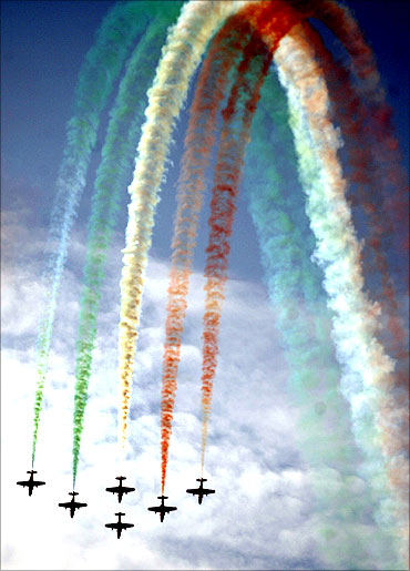 Suryakiran aircraft perform after National Defence Academy's passing-out parade in Pune.