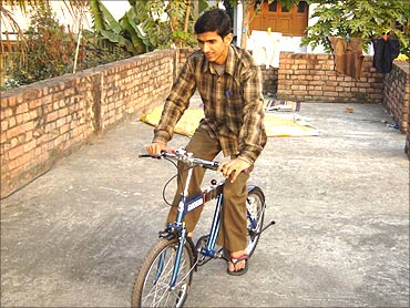 Sandeep with his bicycle.
