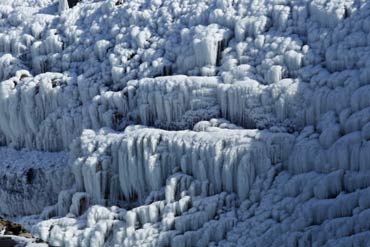 An ice-covered cliff is seen in Golfoss, Iceland.
