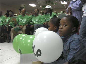 A girl holds a balloon at an election rally of Bermuda's ruling Progressive Labour Party in the capital of Hamilton.