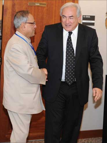 Finance Minister Pranab Mukherjee greets IMF Managing Director Dominique Strauss-Kahn.