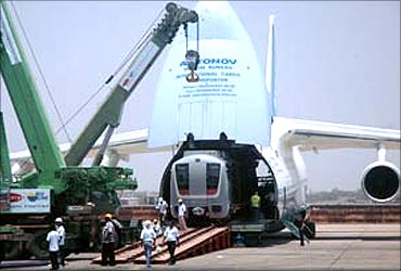 An Antonov cargo aircraft carrying a new metro rail carriage.
