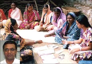 An SKS staff working with village women. Inset: Suresh Gurumani.