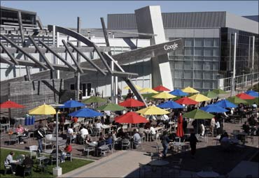 Employees take their lunch break in the sun at Google headquarters in Mountain View.