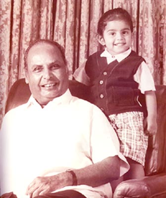 Dhirubhai Ambani with his grandson.