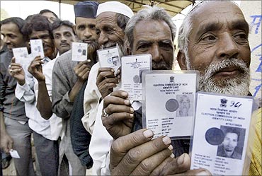 Indian citizens with their identity card.