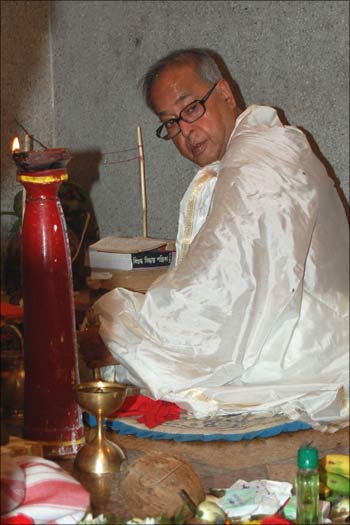 Then external affairs minister Pranab Mukherjee all set to perform the Chandi Path for Durga Puja in his village in West Bengal. Photograph: Dipak Chakraborty