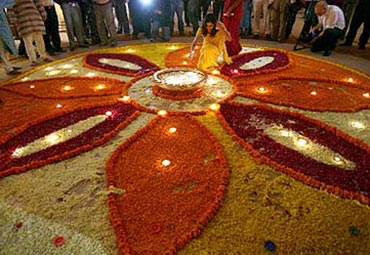 Lamps lit during Diwali mahurat trading at Bombay Stock Exchange.