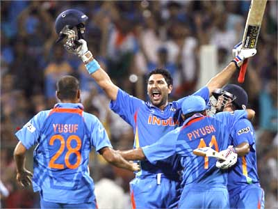 Members of India's cricket team celebrate their world cup victory over Sri Lanka in Mumbai.