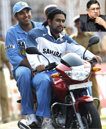 A 2006 file photo of Dhoni (R) and Yuvraj Singh on a motorcycle. Inset: N Srinivasan.