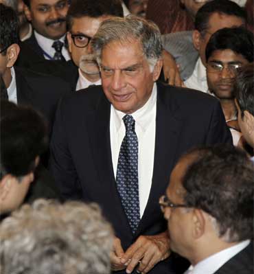 Ratan Tata (C), chairman of the Tata Group, surrounded by the media.
