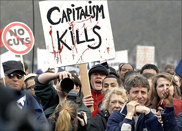 Demonstrators attend a rally in Hyde Park, during a protest organised by the Trades Union Congress.