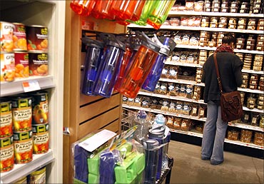 A woman shops for groceries at a Whole Foods supermarket in New York.